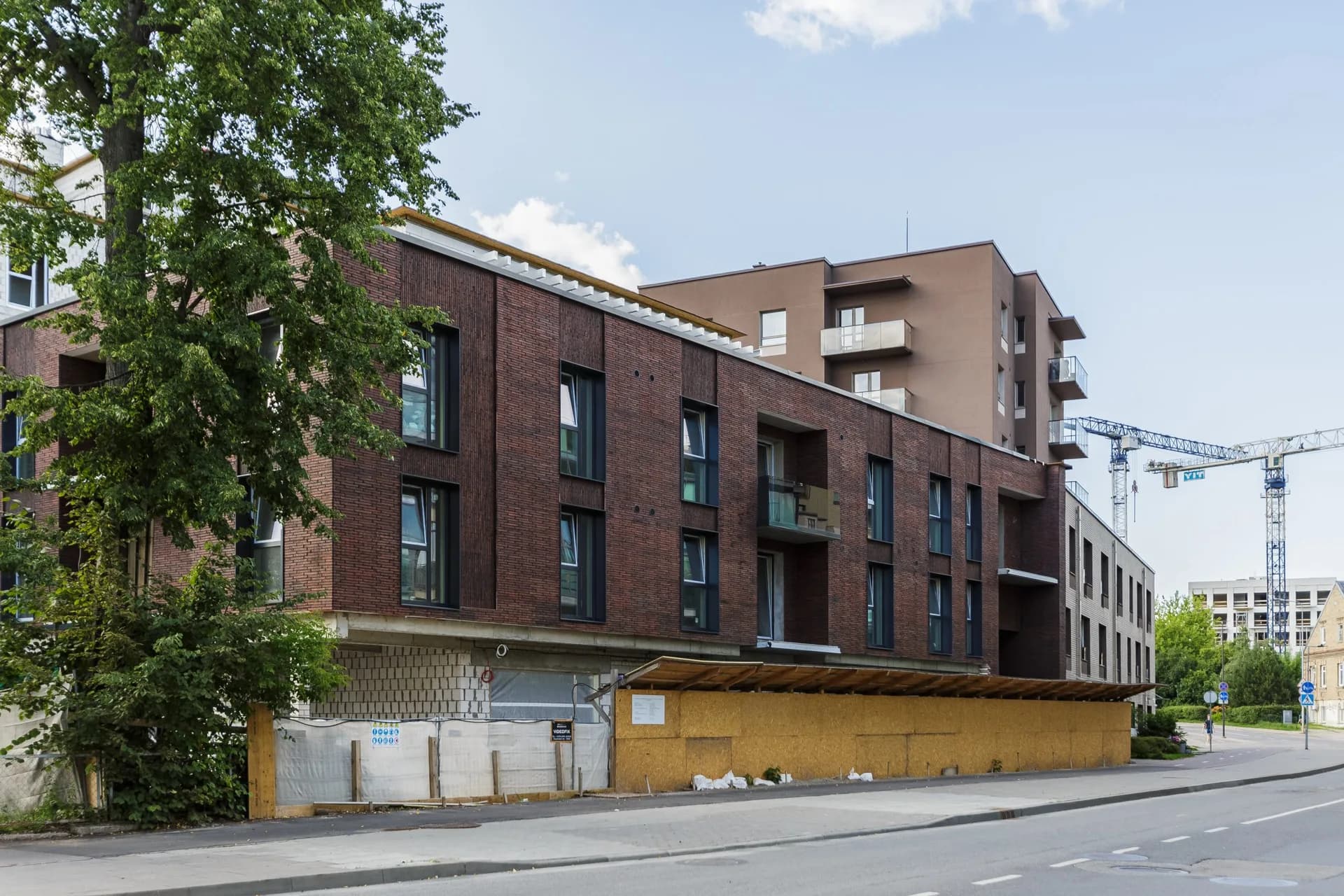 Façades of the Nexto residential complex with KODERUS 2IN1 panels